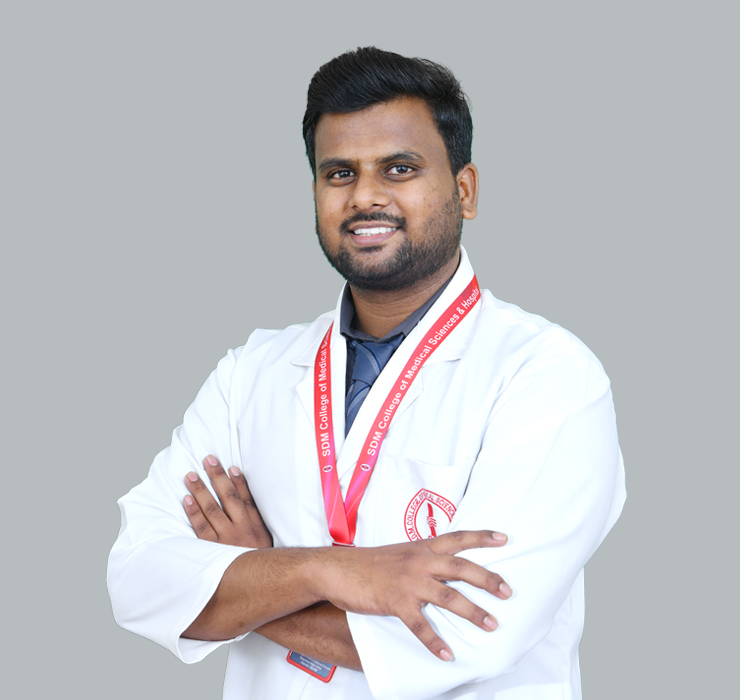 Dr. Harshawardan K C